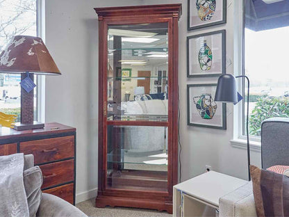 Howard Miller Cherry & Glass Curio Cabinet