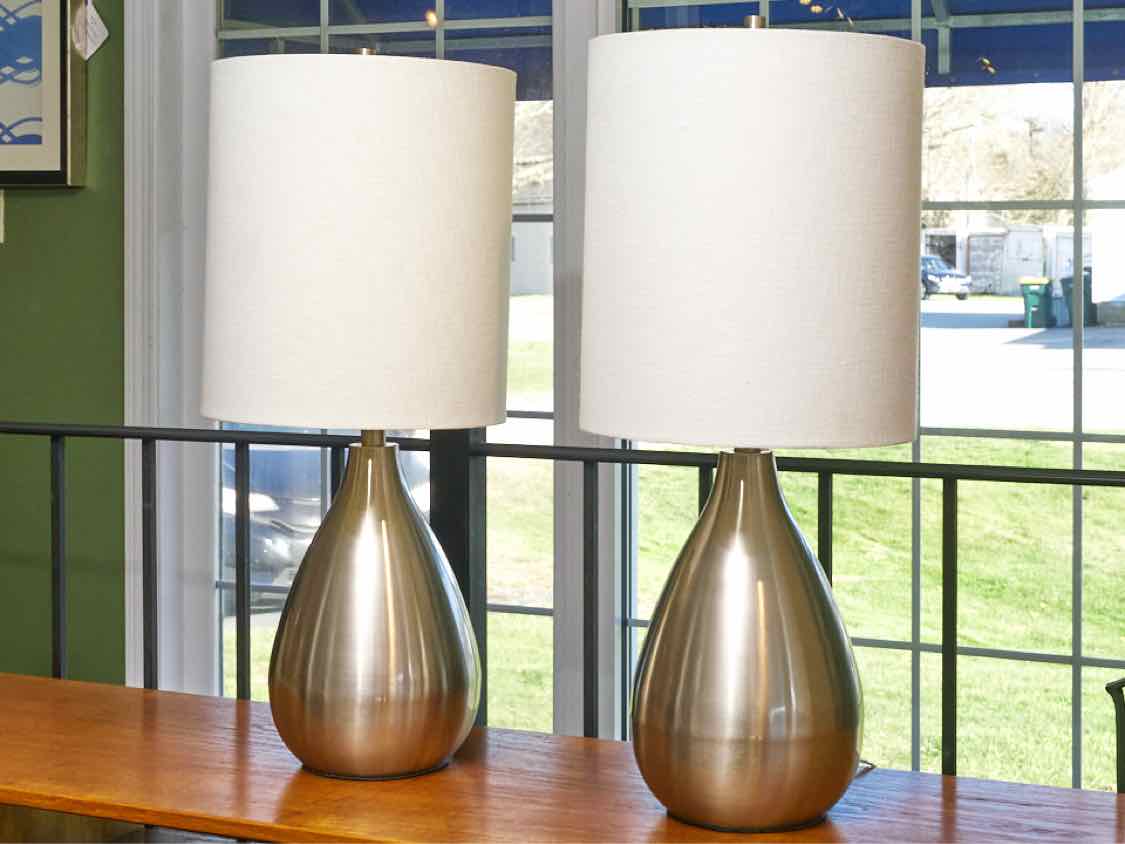 Pair Of Chrome Finish Metal Off White Shade Table Lamps