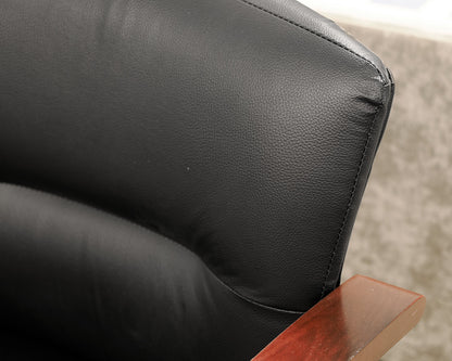 Black Faux Leather Office Chair on Dark Wood Frame