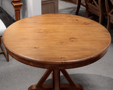 Round Wooden Pedestal Dining Table