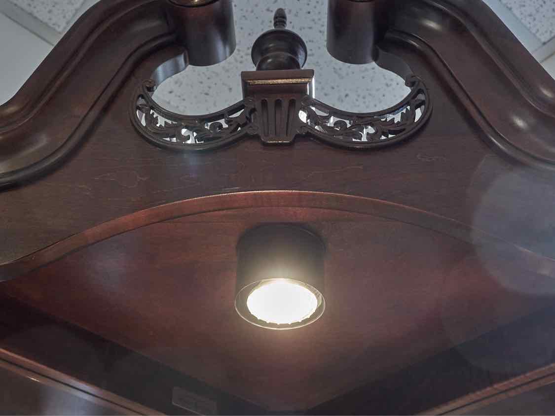 Howard Miller Cherry Lighted Corner Cabinet
