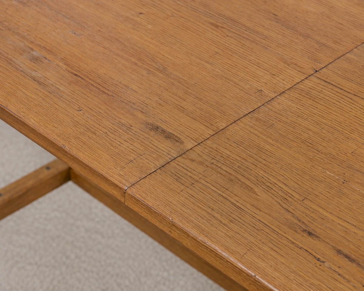 Oak Dining Table W/ 2 Leaves  In Honey Finish Featuring An H-Stretcher Base