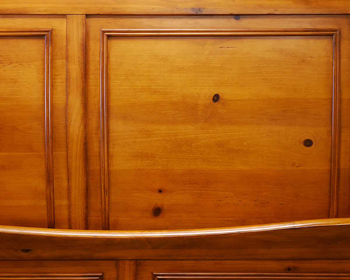 Queen Sleigh Bed in a Knotty Pine Wood