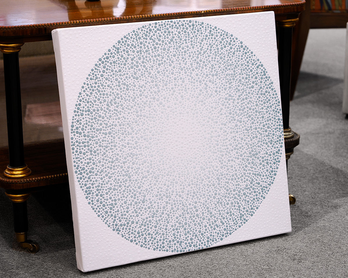 White and gray dot painted canvas