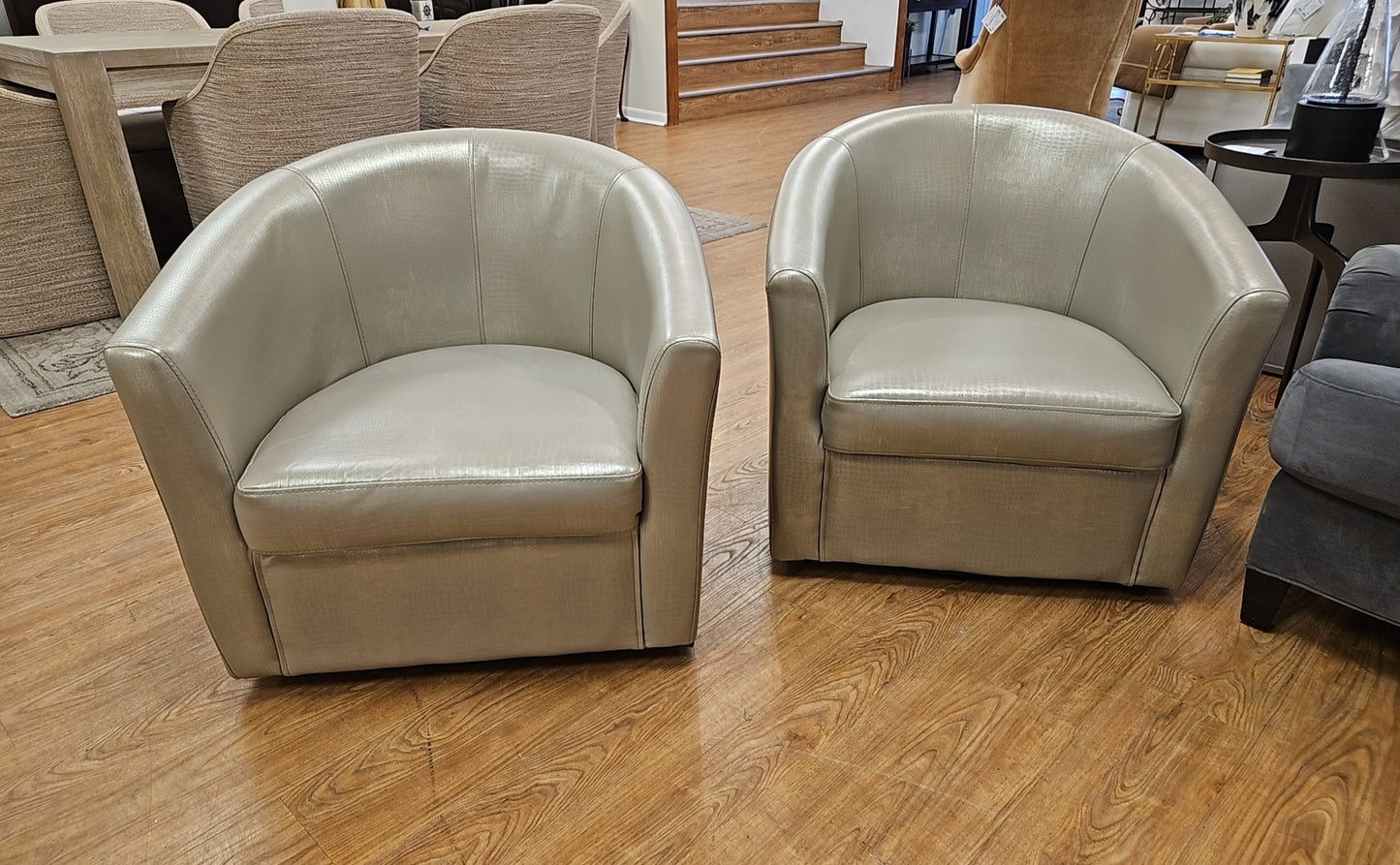 Pair Of Champagne Swivel Chairs