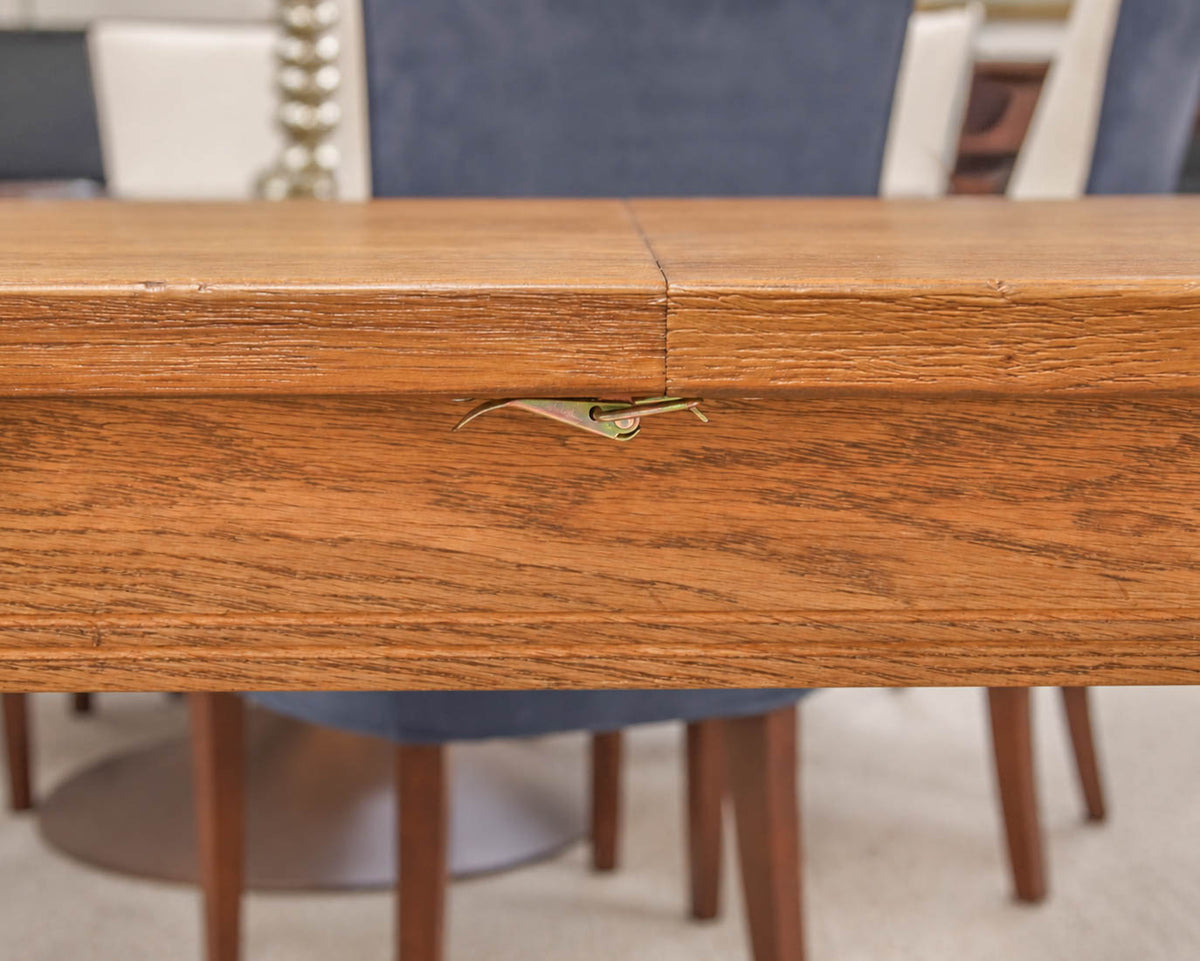 Oak Dining Table W/ 2 Leaves  In Honey Finish Featuring An H-Stretcher Base