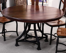 Round Mahogany Table With Metal Base and Six Chairs