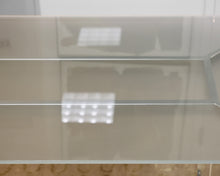 Ligne Roset Chrome Dining Table with Frosted Glass Top.