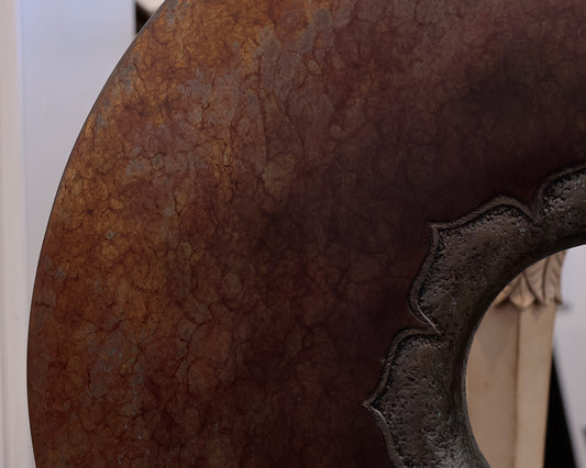 Round Metal and Stone Statue
