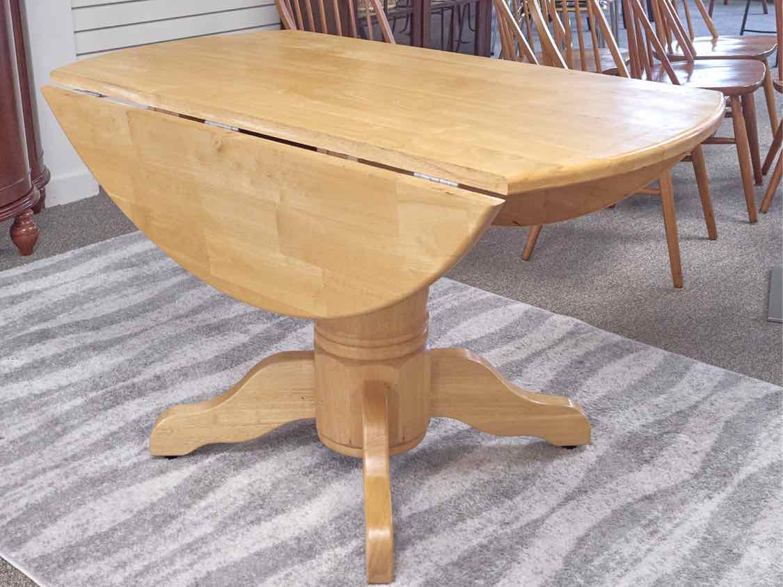 Blonde Wood Pedestal Base Drop Leaf Dining Table