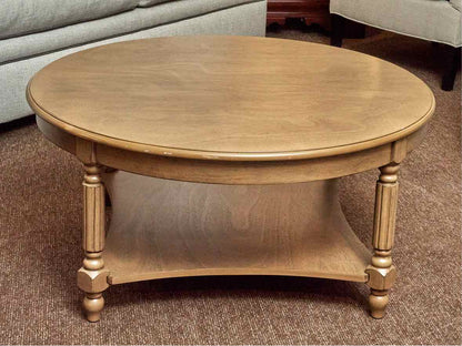 Synergy House  Stained Ash Round With Lower Shelf Turned Legs Cocktail Table
