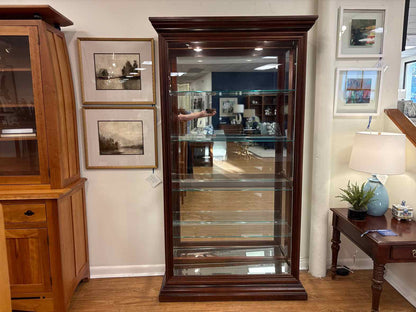 Pulaski Lighted Side Entry Curio Cabinet in Cherry