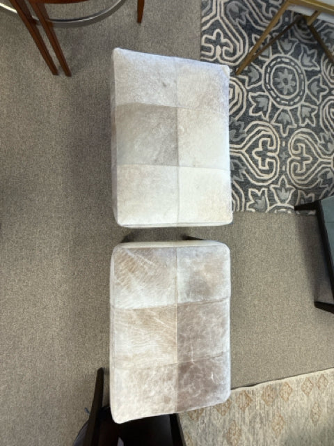 Pair of Cowhide Ottomans on Brushed Steel Frame