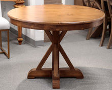 Round Wooden Pedestal Dining Table