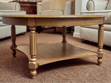 Synergy House  Stained Ash Round With Lower Shelf Turned Legs Cocktail Table