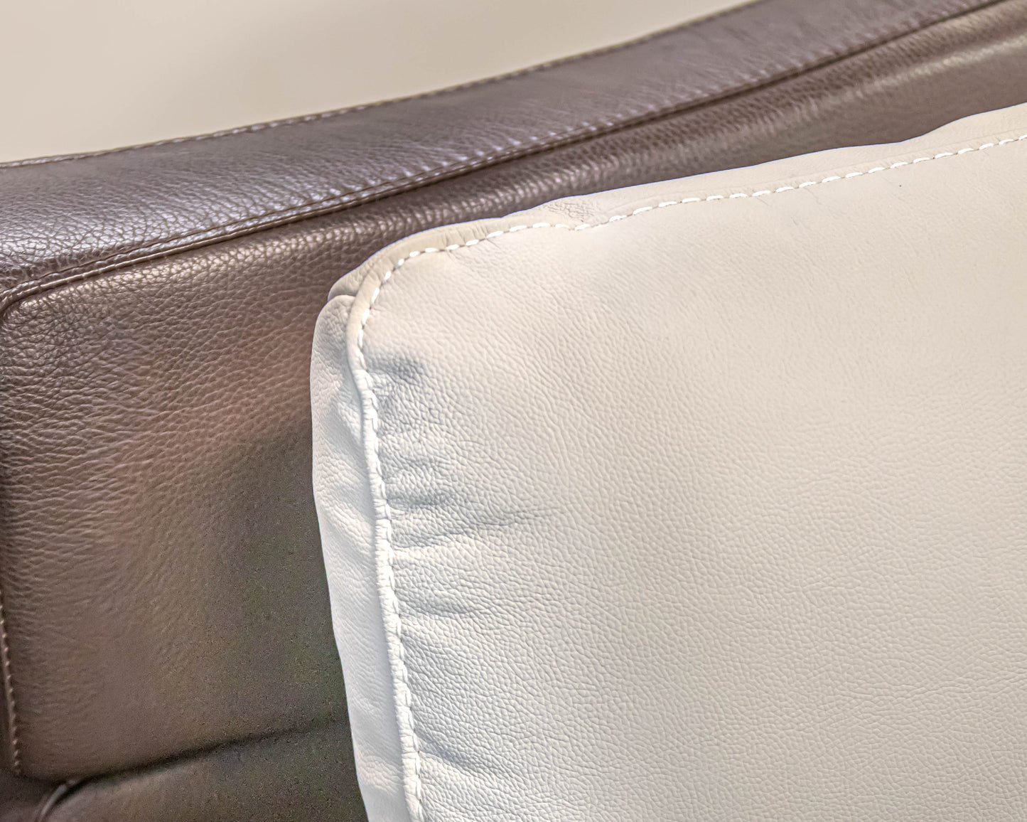 Violino Cream Leather Dual Powered Reclining Wallhugger Loveseat