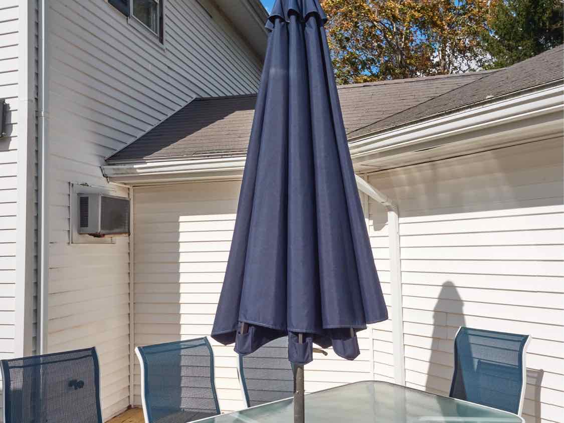 Glass Top White  Metal Outdoor Dining Table, Navy Umbrella 8 Mesh Navy Chairs