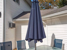 Glass Top White  Metal Outdoor Dining Table, Navy Umbrella 8 Mesh Navy Chairs