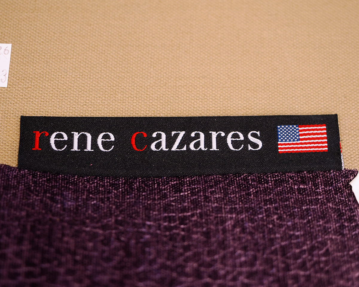 Pair of Rene Cazares Purple Upholstered Swivel Chairs