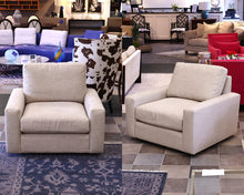 Pair of Arhaus Swivel Chairs