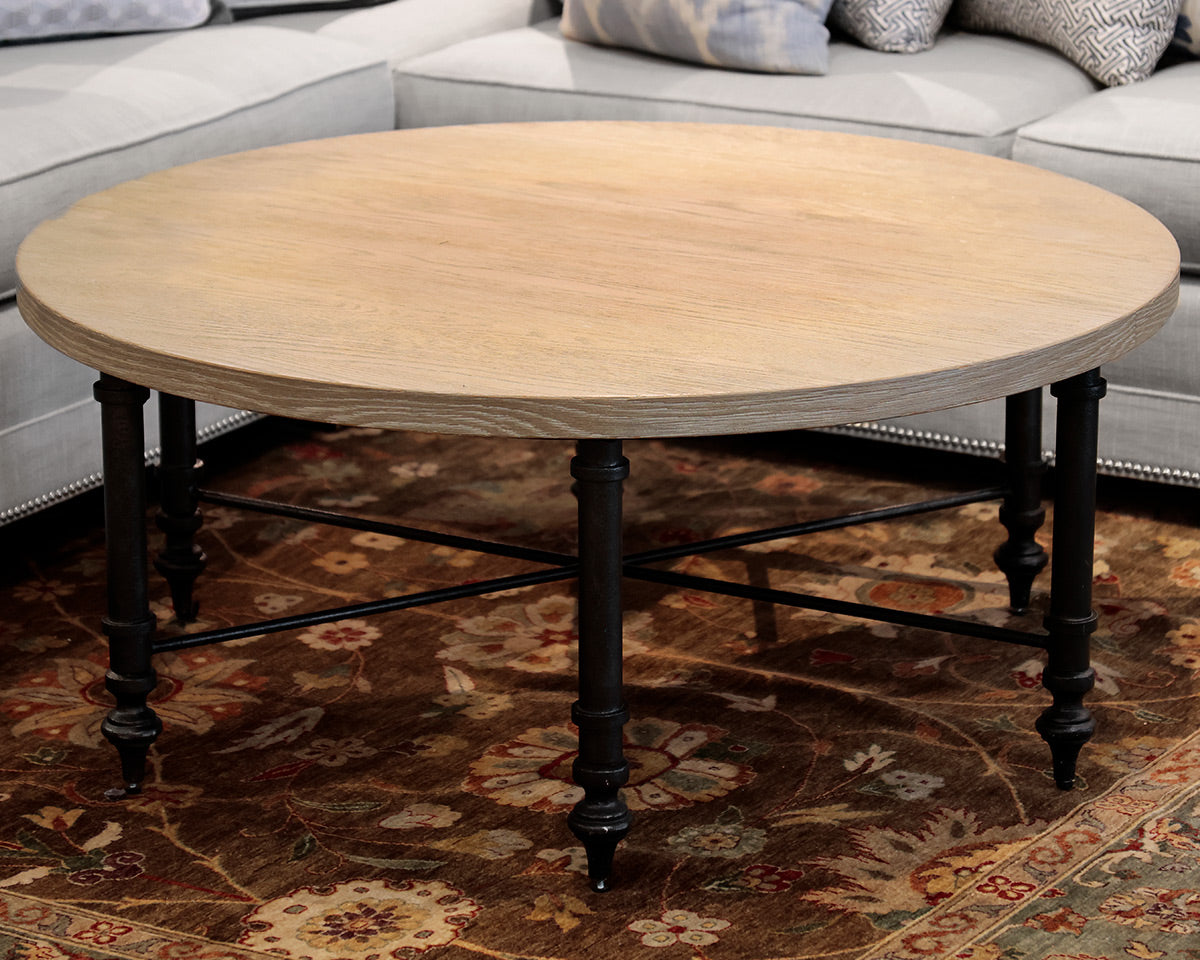 Round Natural Wood Cocktail Table With Black Metal Base