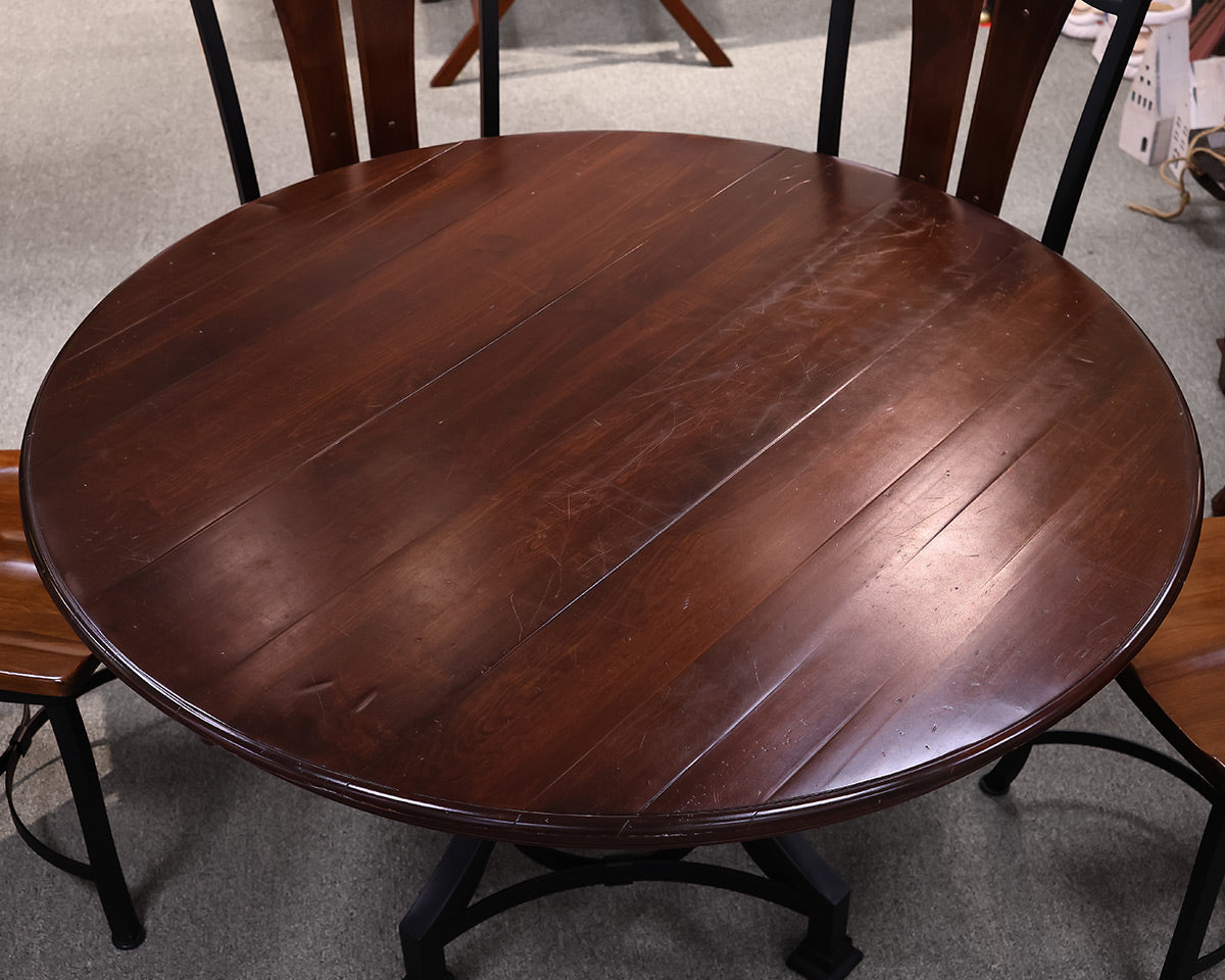 Round Mahogany Table With Metal Base and Six Chairs