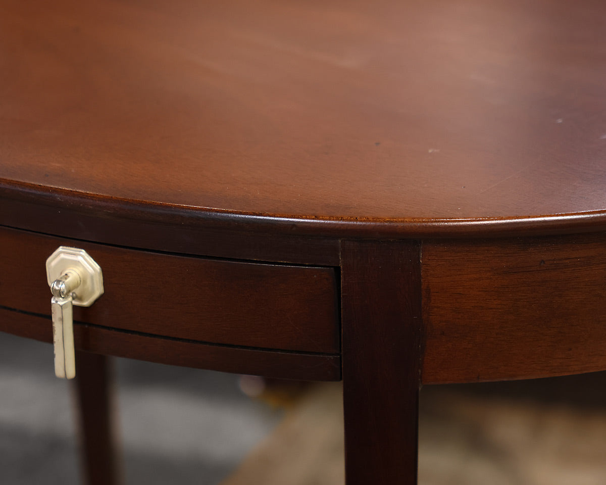 Pair of Oval Shaped Mahogany Side Tables