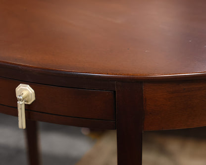 Pair of Oval Shaped Mahogany Side Tables