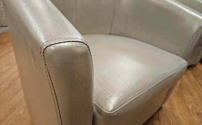 Pair Of Champagne Swivel Chairs