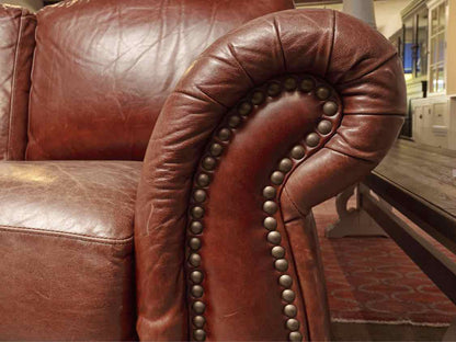 Robinson & Robinson Inc  Amber Cognac Leather 3 Cushion Nailhead Trim Sofa