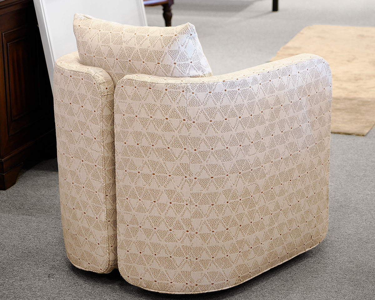 Pair of Vanguard Upholstered Swivel Chairs