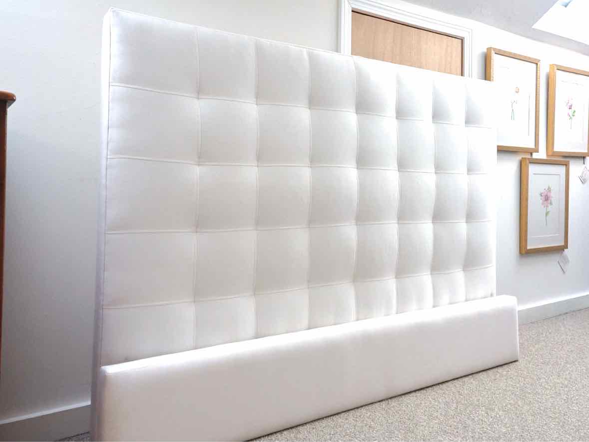 White Upholstered Queen Bed with Quilt Design Back Headboard
