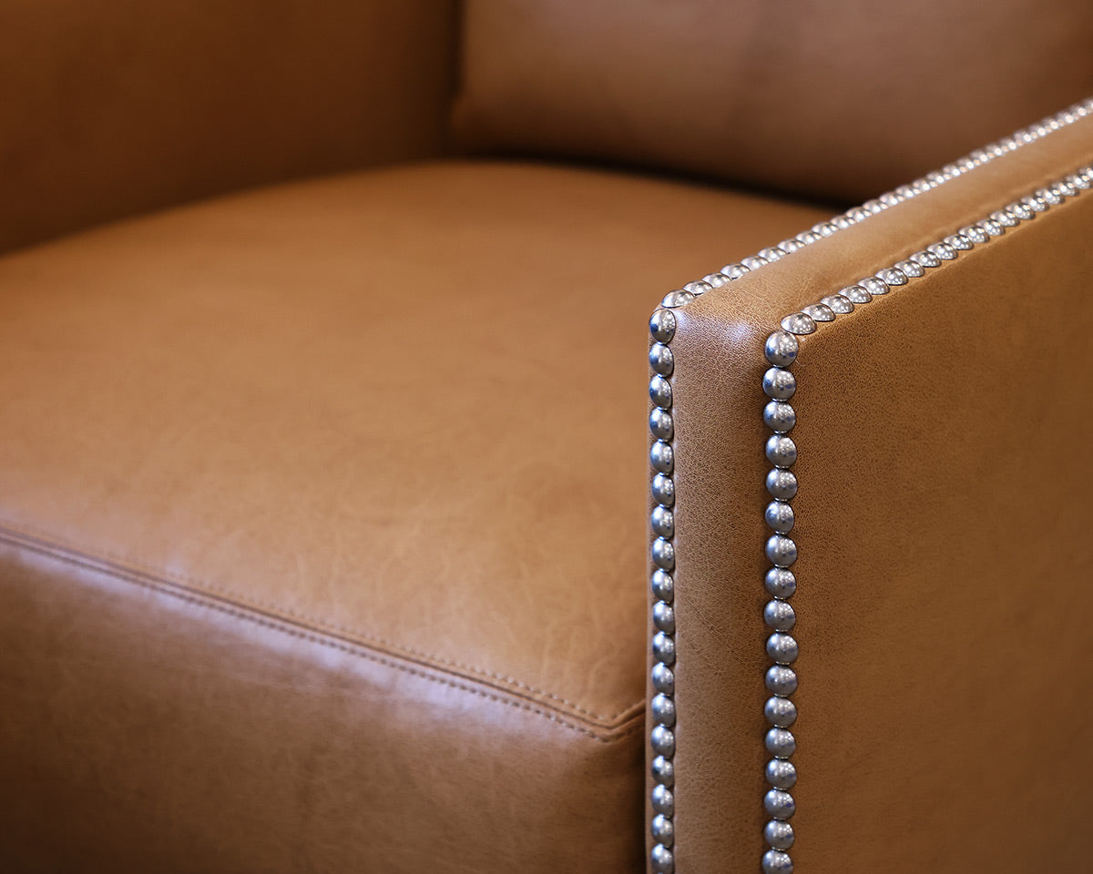 Ironies Tule Lounge Chair in Saddle Leather with Silver Nailhead Trim