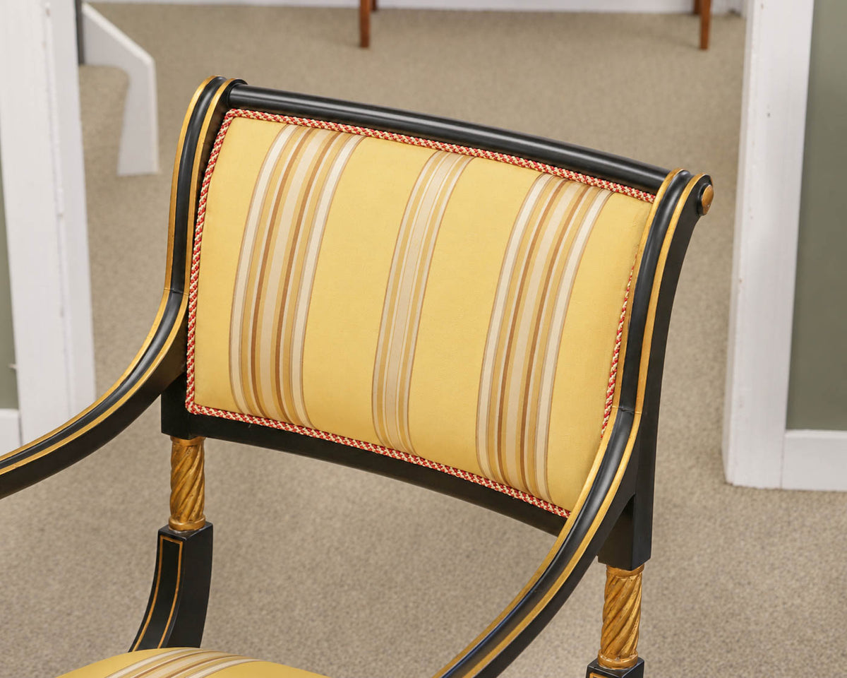 Pair of Regency Ebonized Arm Chairs with Gold Trim & Striped Yellow Silk