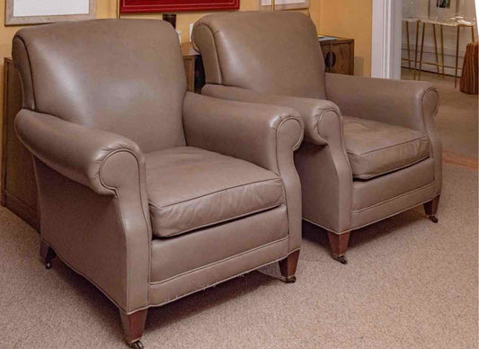 Pair Of Brunschwig & Fils Taupe Leather Club Chairs On Casters