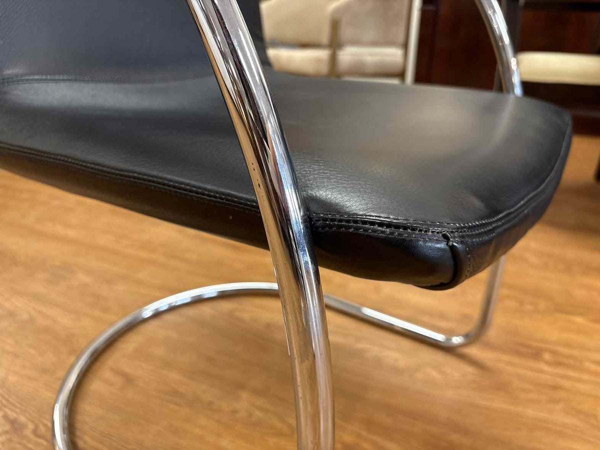 Pair of Black Leather and Steel Lens Chairs