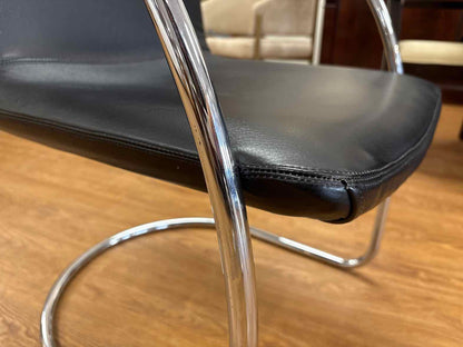 Pair of Black Leather and Steel Lens Chairs