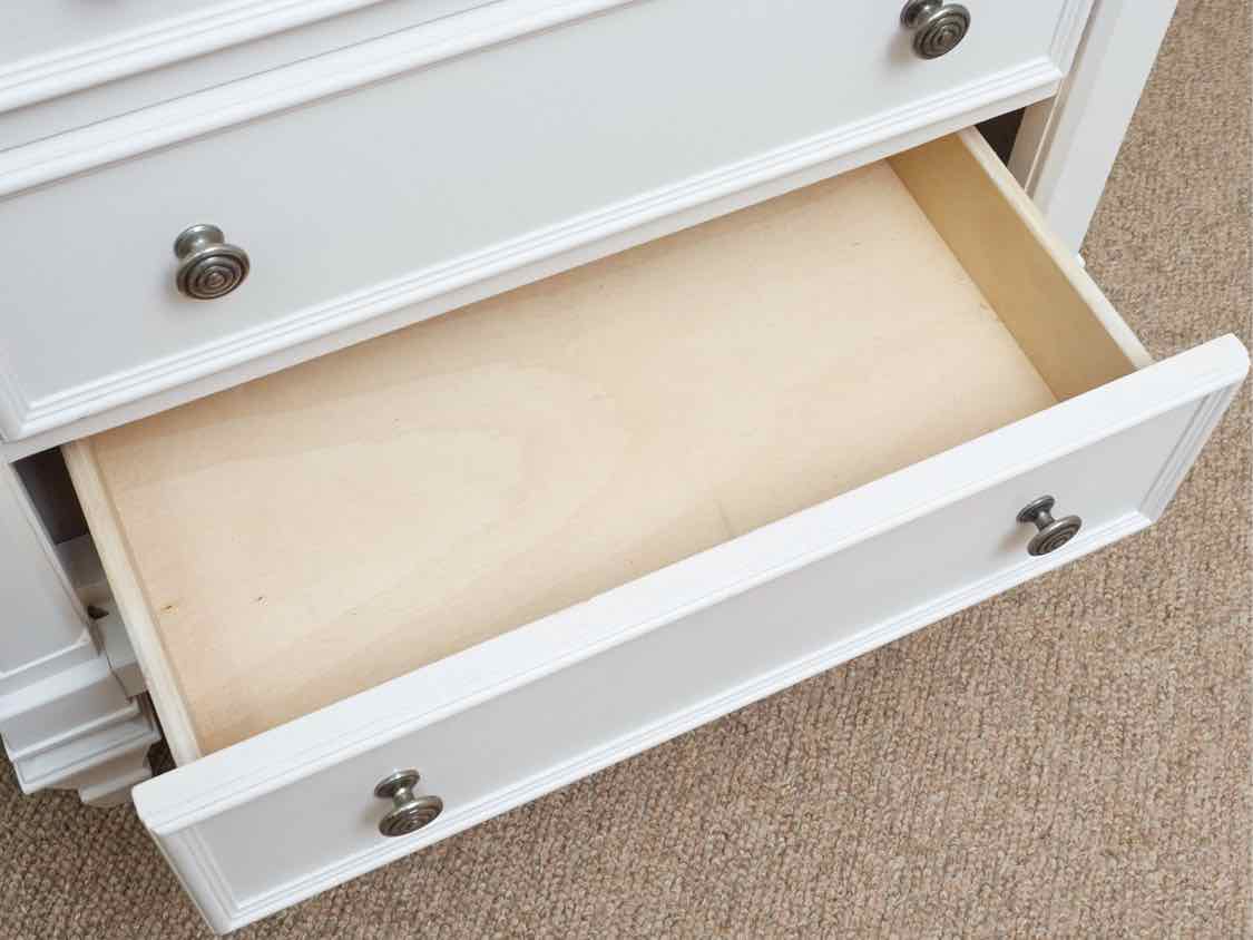 White Finish 3 Drawer Nightstand with Pull-Out Shelf