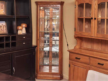 Howard Miller Oak Corner Display Curio Cabinet