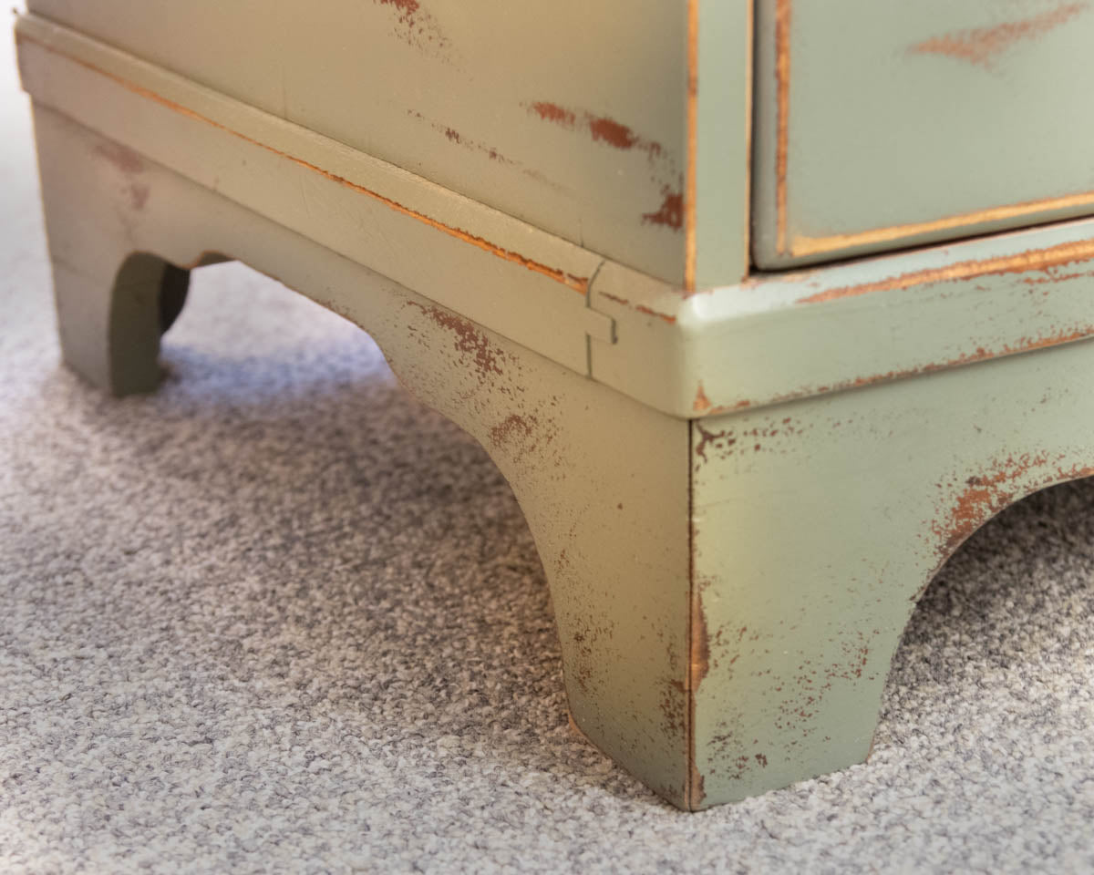 Distressed Sage Green Dresser with Natural Wood Finish Pulls