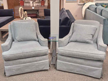 Pair of Roll Back Swivel Chairs