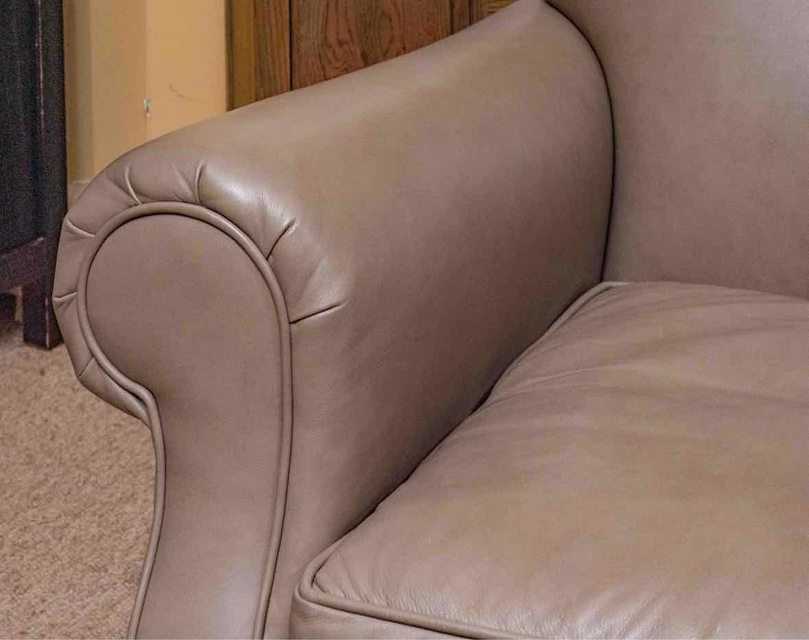 Pair Of Brunschwig & Fils Taupe Leather Club Chairs On Casters