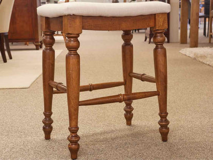 Pair of Linen Seat Counter Stools on Medium Finish Wood Frame
