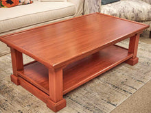 Persimmon Rust Antique Finish Cocktail Table with Shelf