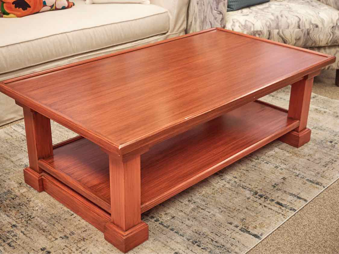 Persimmon Rust Antique Finish Cocktail Table with Shelf