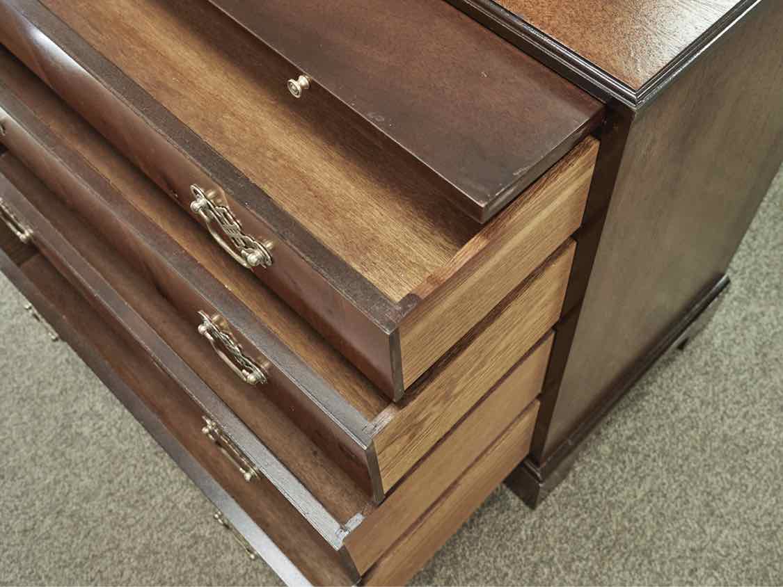 Pair of Two Tone Mahogany Four Draw Chippendale Chests
