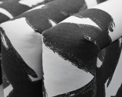 Contemporary Channel-Tufted Ottoman in Black & White