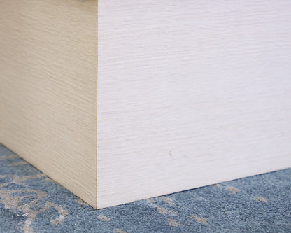 Contemporary S Ottoman with Flocked Navy Upholstery on White Finish Oak Base