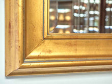 Beveled Mirror in Gold Frame with Red Undertones
