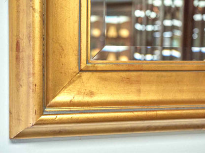 Beveled Mirror in Gold Frame with Red Undertones